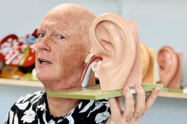 man with ear model. photo.